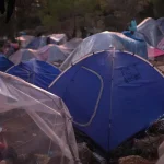 Grécky pilotný tábor pre migrantov a utečencov